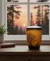 Preview: Warm, orange pet urn with dog and tree at sunset. A loving symbol of the shared time full of joy and play. Honour your pet's memory beautifully – see the options and order.